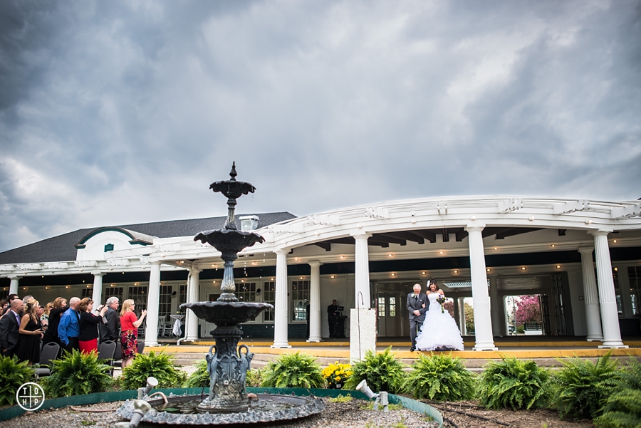 Bride walking down the aisle at Emerson Park
