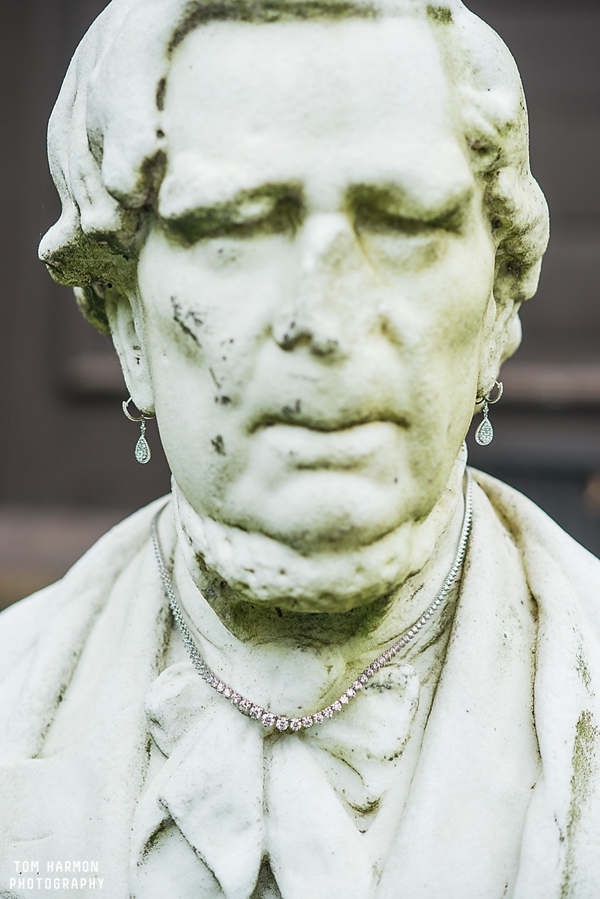 Brides jewelry on statue in Geneva NY